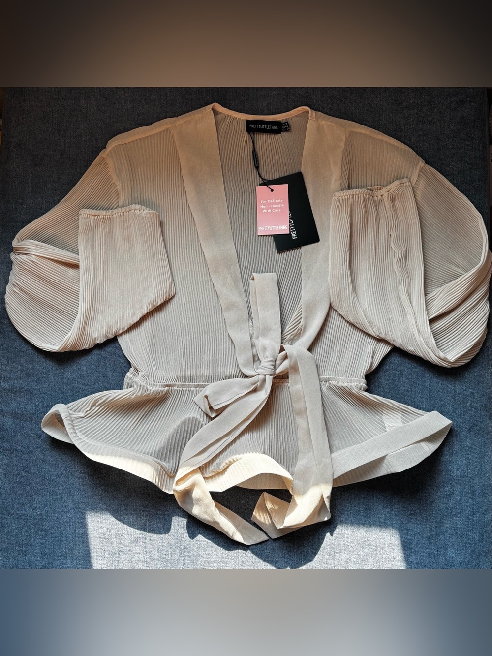 PrettyLittleThing Cream Pleated Tie-Front Blouse
